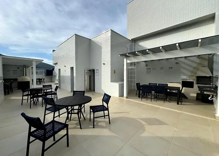 Apartamento novo a 350 m da praia das Toninhas em Ubatuba - 2 dormitórios sendo 1 suite, piscina, varanda gourmet com churrasqueira, ar condicionado, cozinha completa, garagem privativa